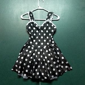 Black dress with white polka dots